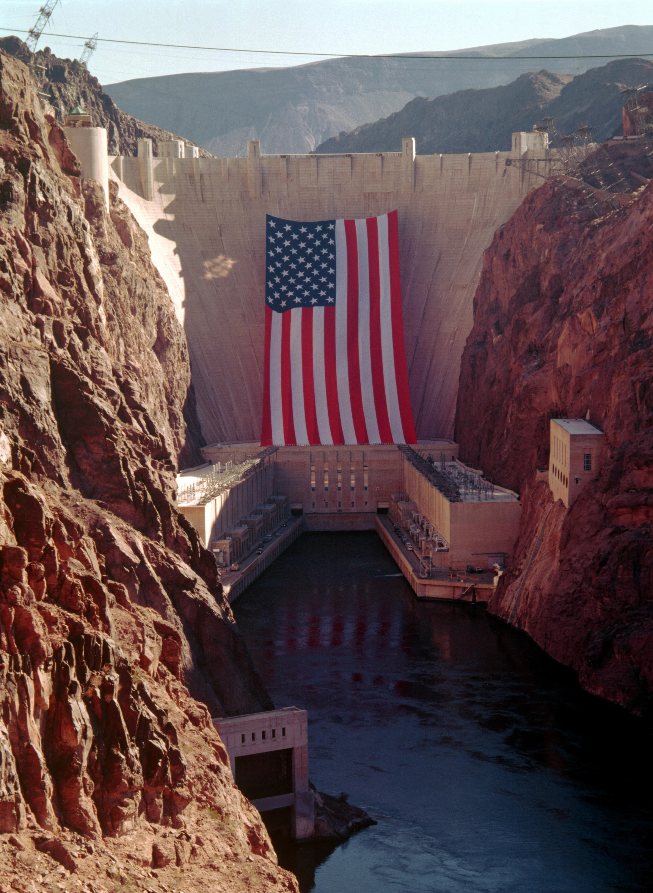 American flag covering Hoover Dam for the 1996 Olympics