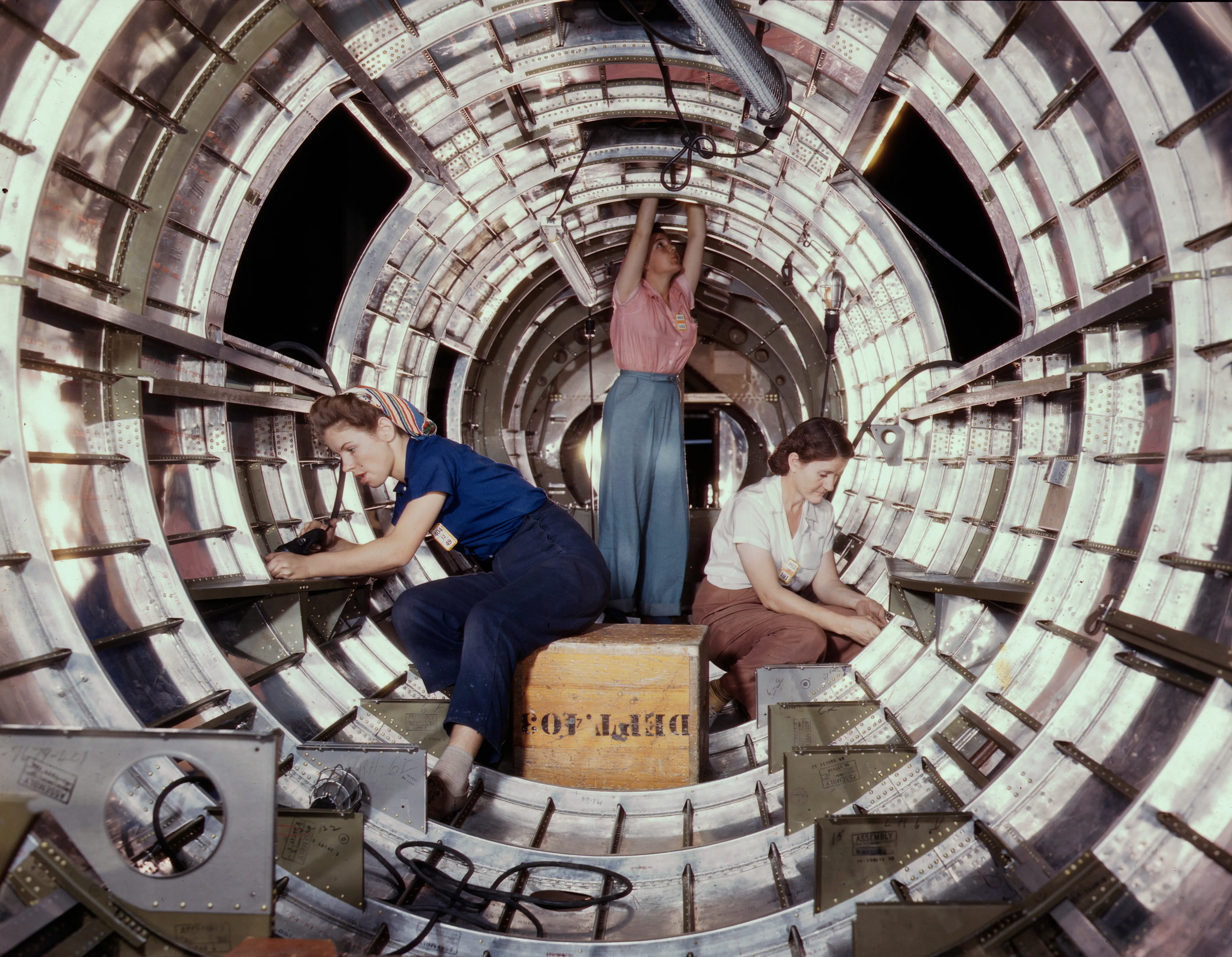 Women workers assemble the tail section of a B-17 Flying Fortress at Douglas Aircraft, Long Beach.
